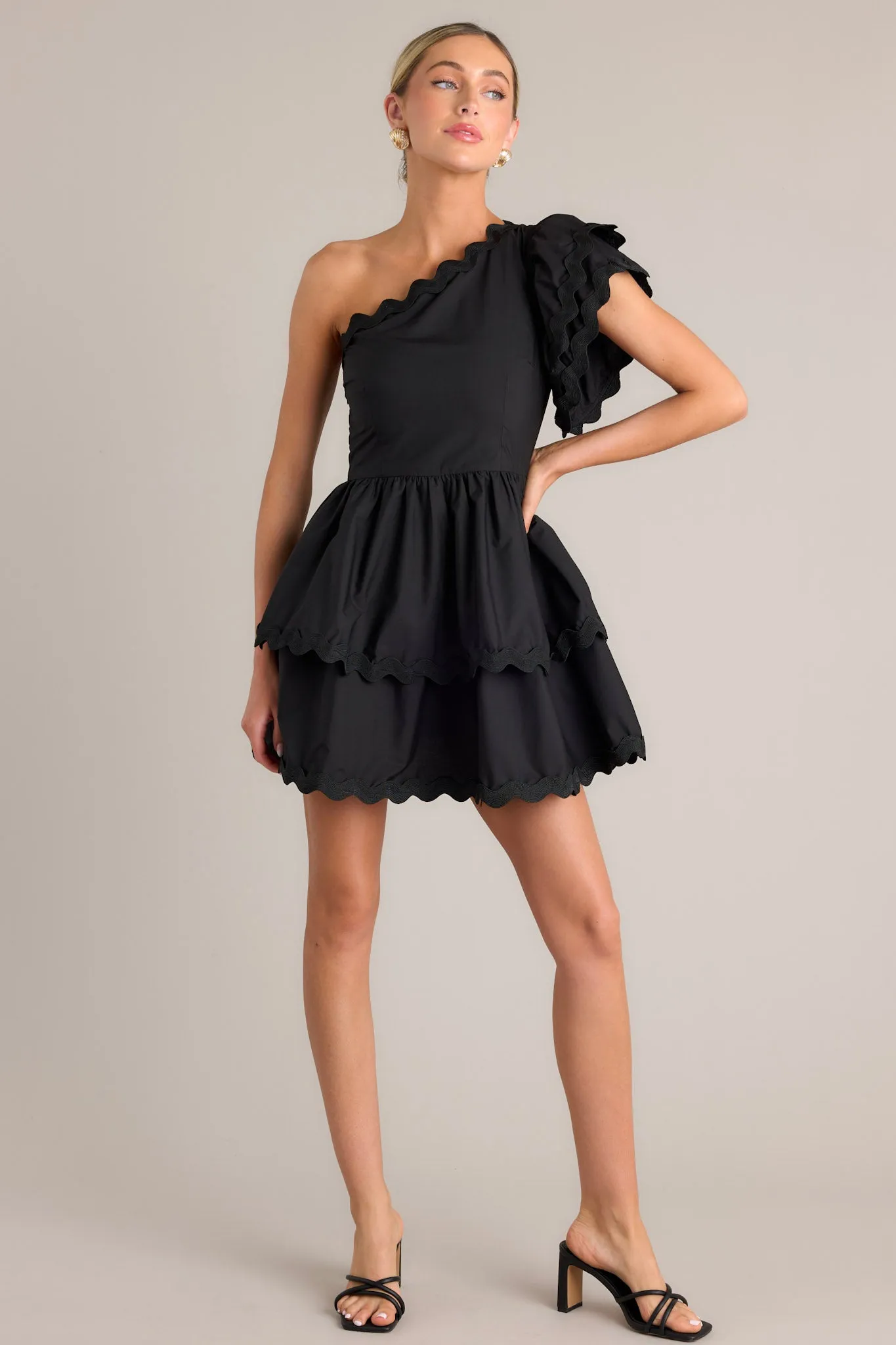 Flirty Flutter Black Scallop Tiered One Shoulder Romper