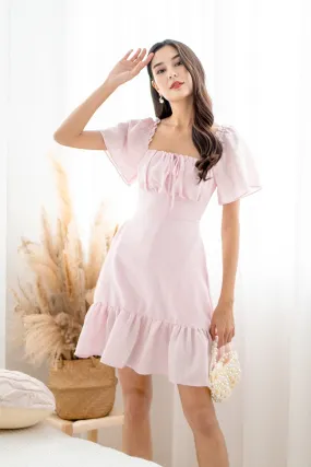 KHELSIE RUCHED FLUTTER SLEEVE ROMPER DRESS IN SWEET PINK