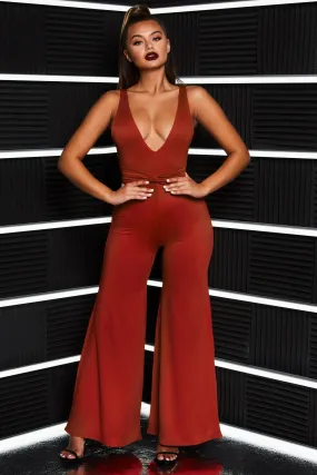 That Cuts Deep Twist Front Plunging Wide Leg Jumpsuit in Red